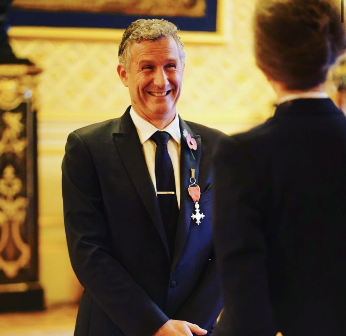 adam-hills-receives-mbe-for-promoting-disability-in-sport-token